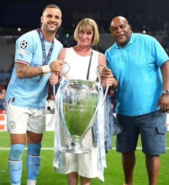 Tracey Walker with her husband Michael and son Kyle Walker after the Manchester City victory in 2023 